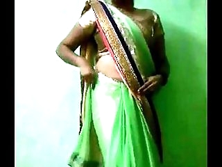 Indian Bhabhi In Sari Unwrapping Naked - IndianHiddenCams.com
